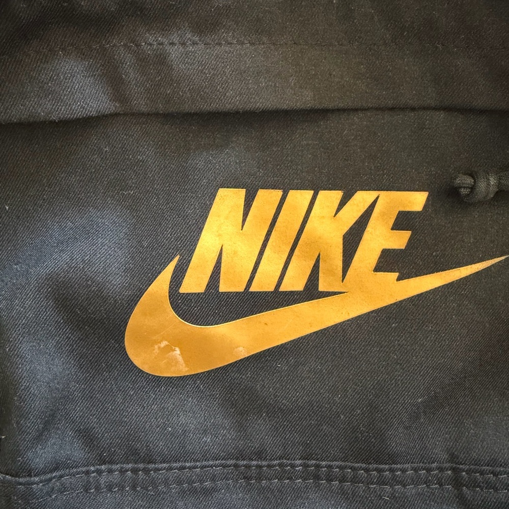 Nike Black sling bag with Gold Logo